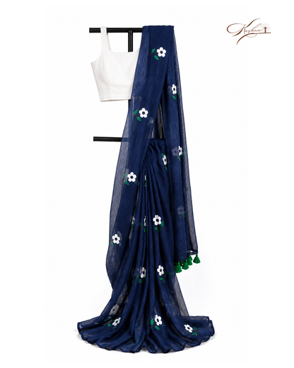 Elegant Navy Blue Mulmul Saree with Floral Embroidery & Green Tassel Border
