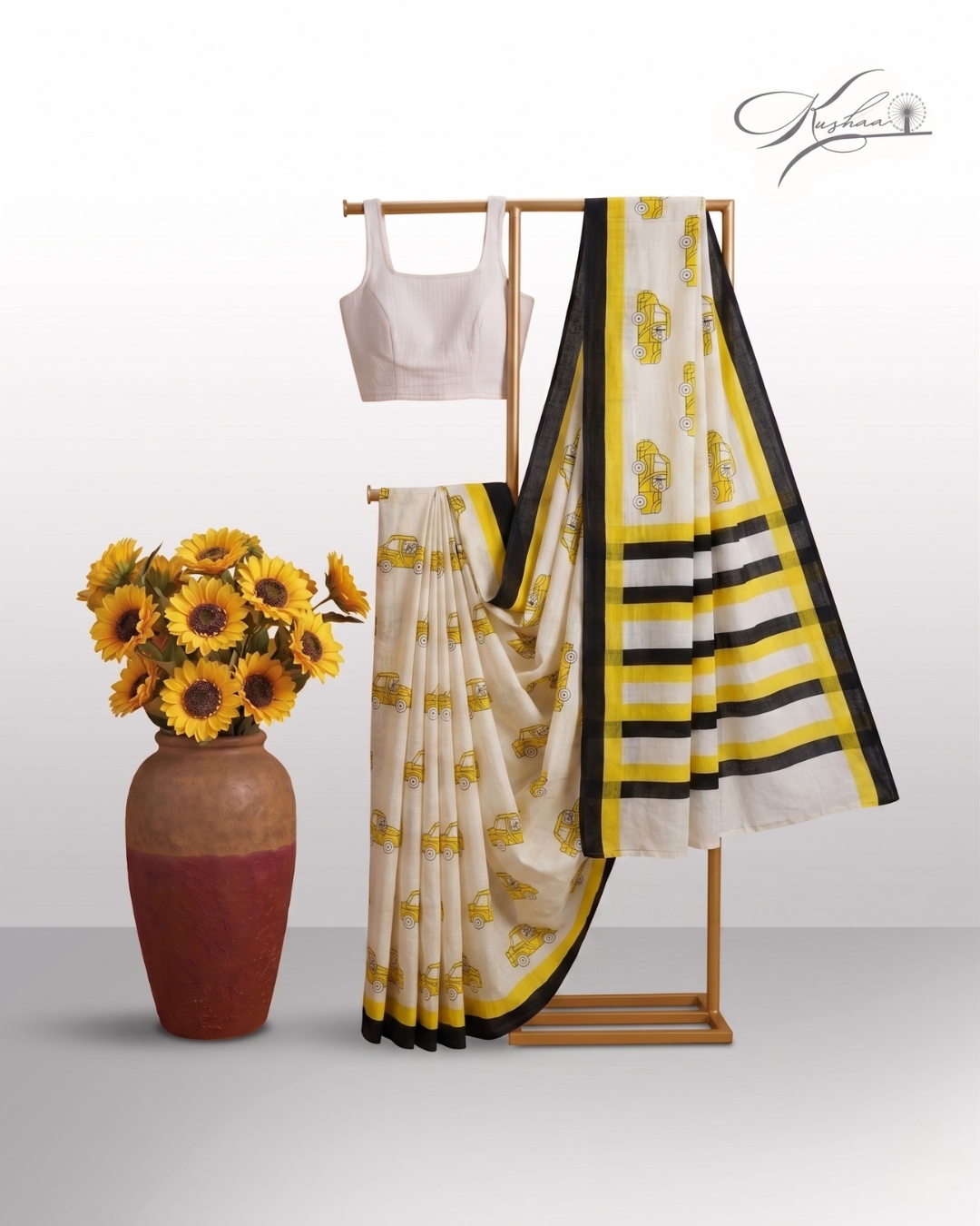 Stylish Off-White Mulmul Saree with Yellow Car Print & Striped Border